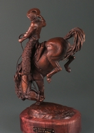 Man riding bronc