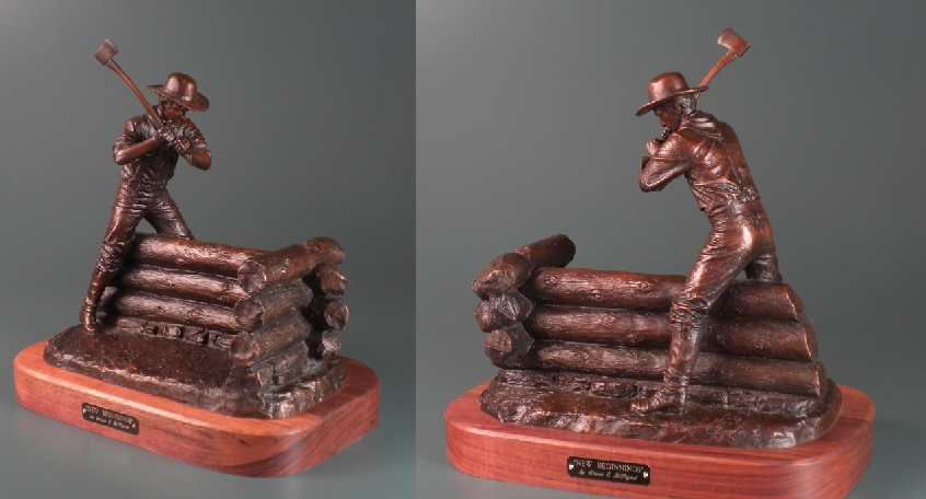 Sculpture of man building a cabin