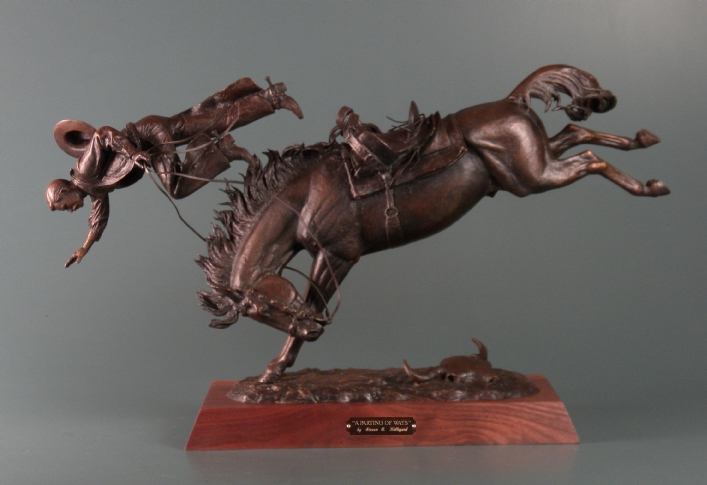 A Parting of ways - Man being bucked off of horse.